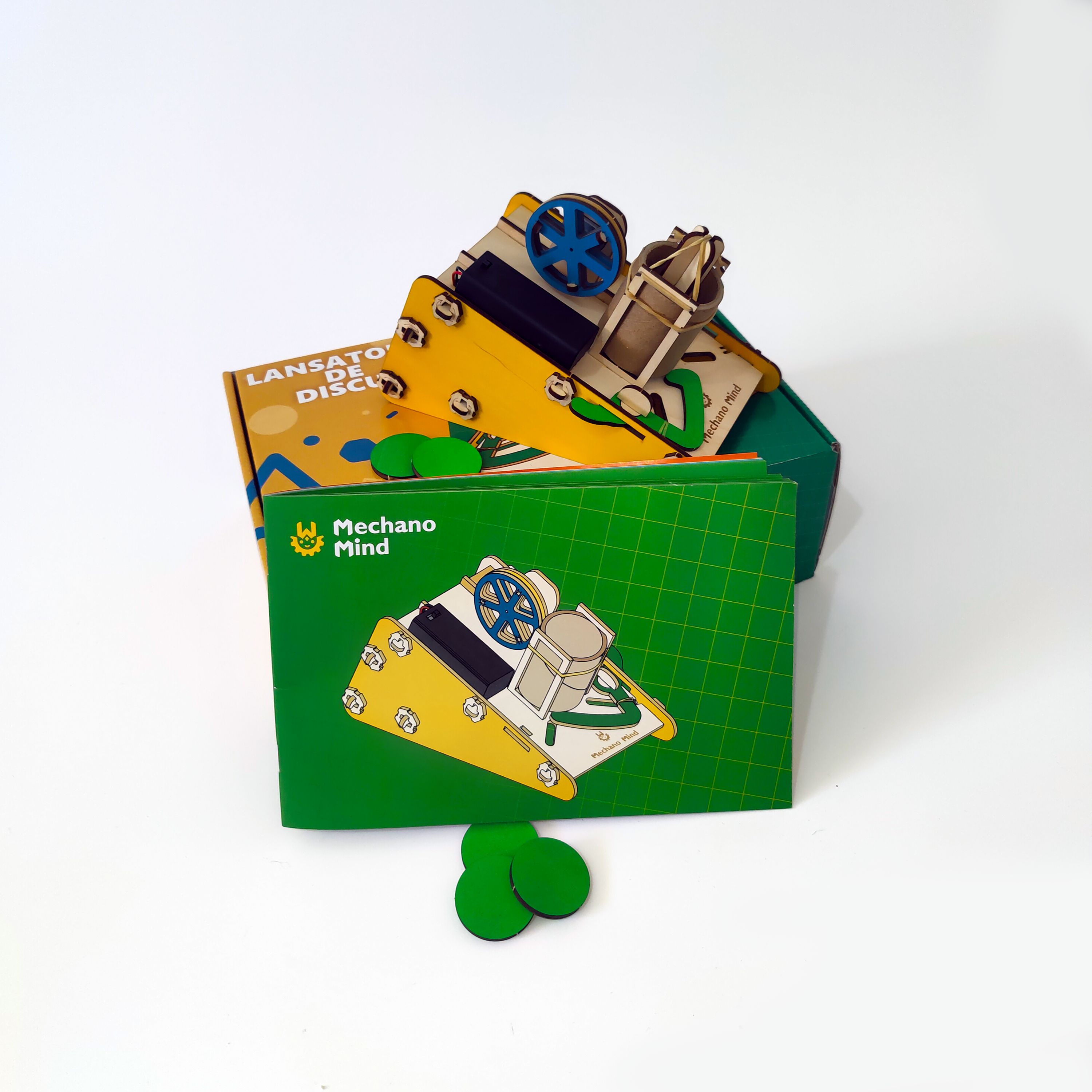 Wooden disk launcher displayed with its colourful Mechano Mind packaging