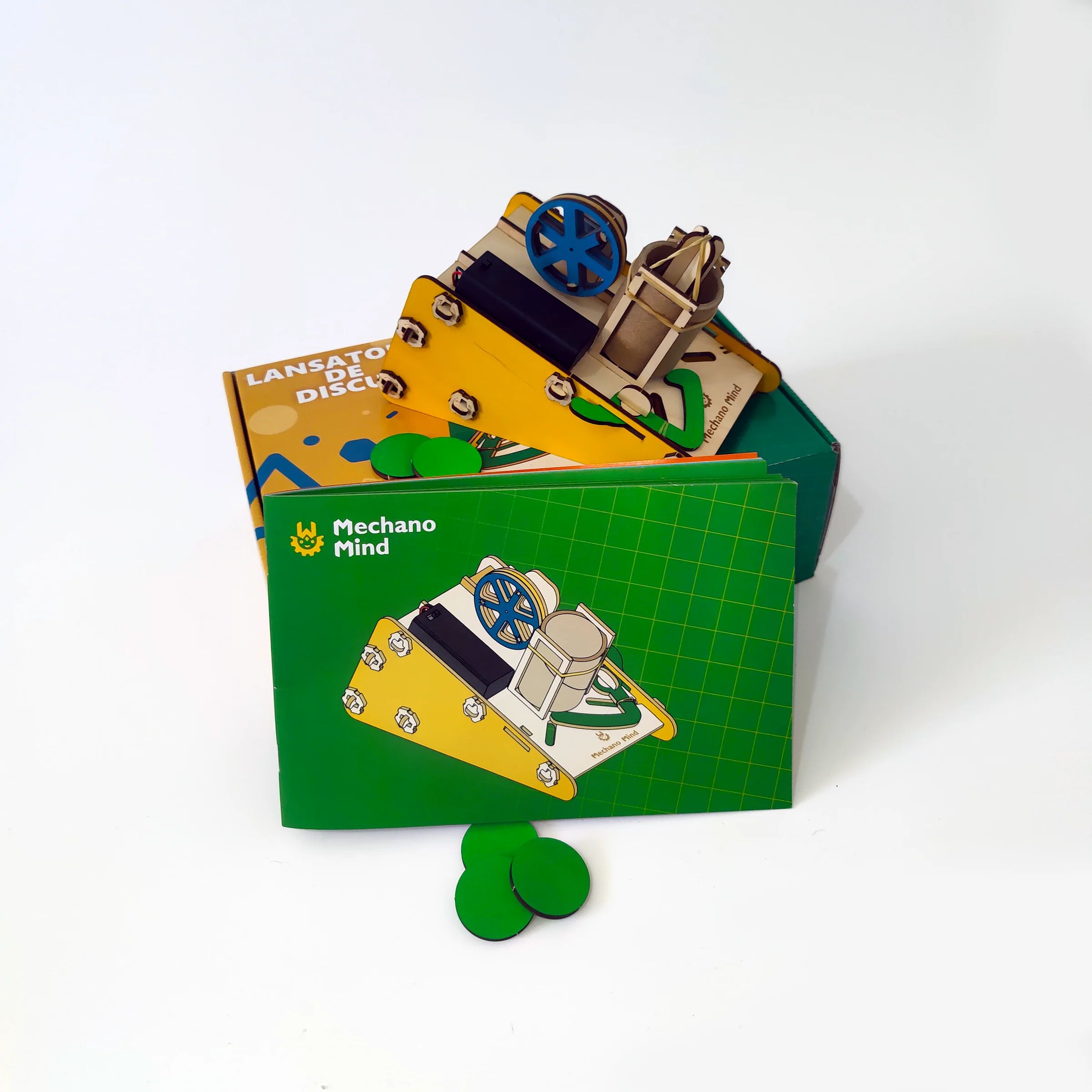 Wooden disk launcher displayed with its colourful Mechano Mind packaging