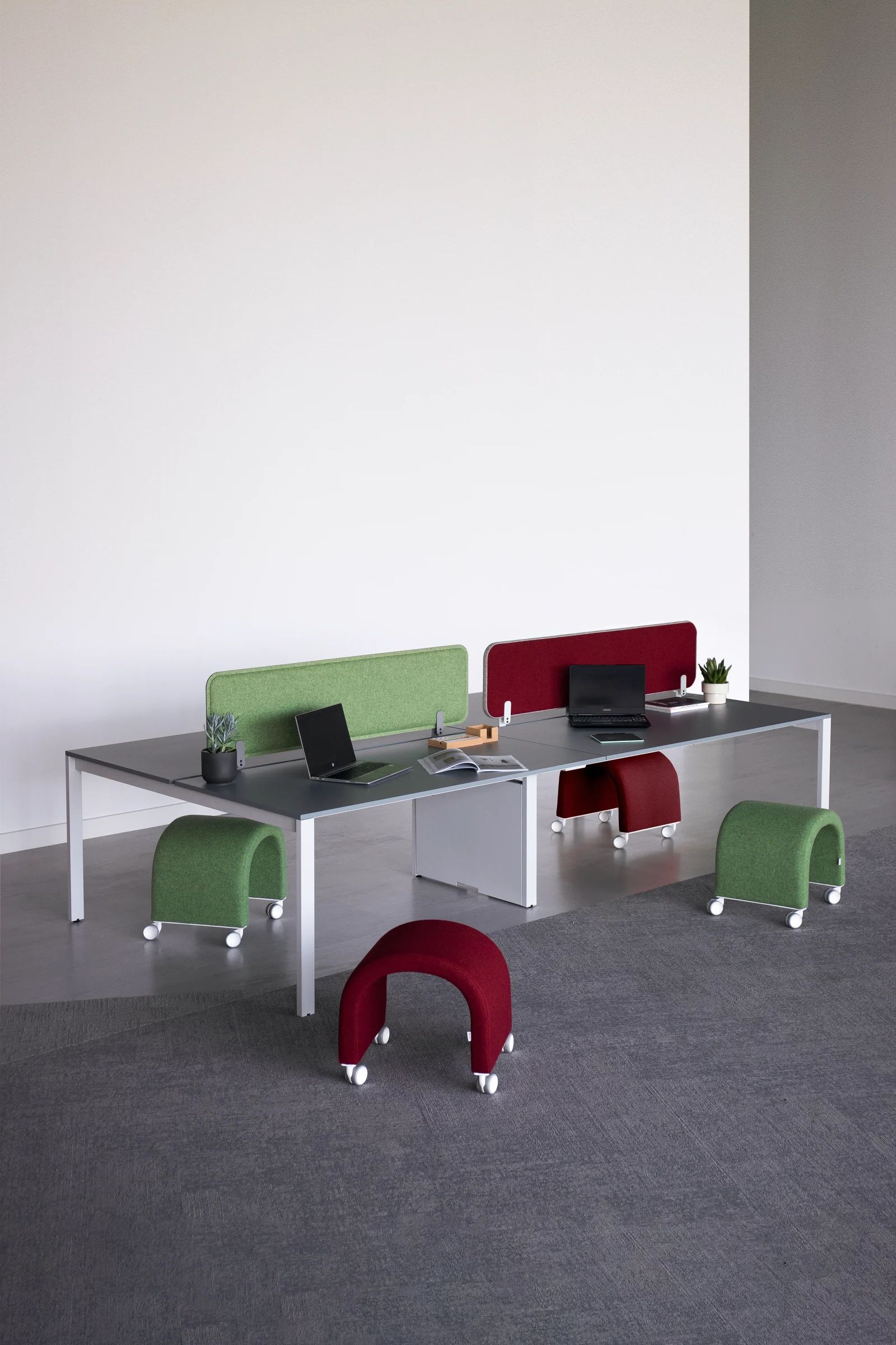 Easyslide office desk photographed against a dark background